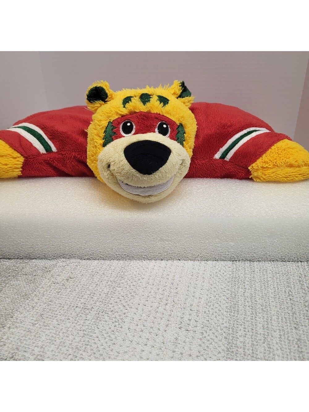 Fabrique Innovations NHL Pillow Pet featuring the Minnesota Wild team logo.